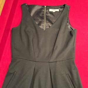 Classic black sleeveless knee length dress